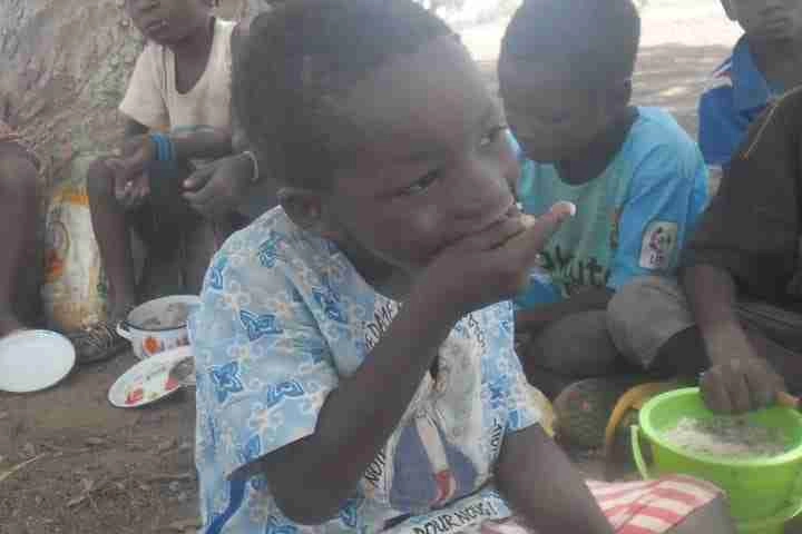 child eats lunch
