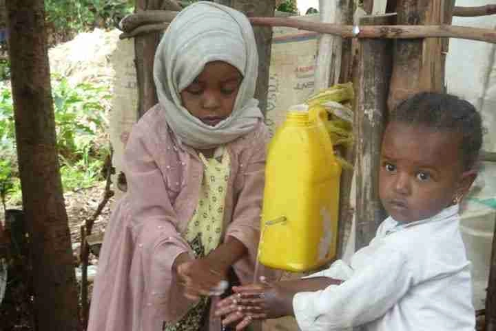 Children washing hands