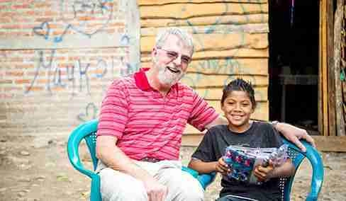 Picture of Doug with his sponsored child