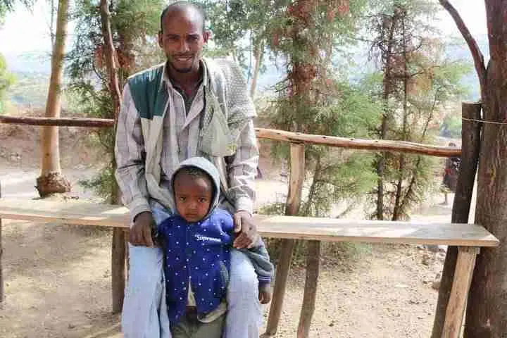 Picture of Hussein with his son
