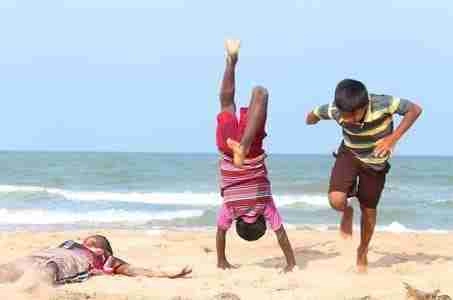 Kids playing on the beach