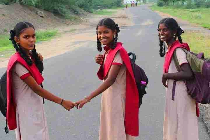 Girls holding hands