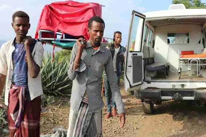 People carrying stretcher