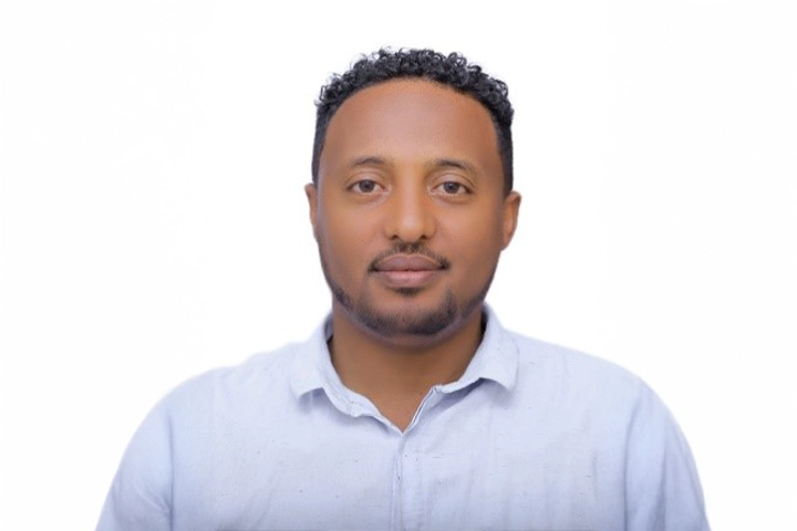 Wondimeneh in a light blue business shirt