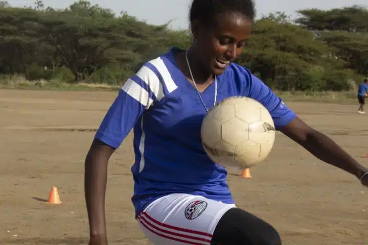 Betselot playing soccer
