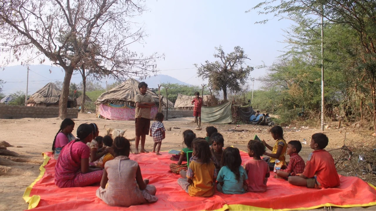 The classroom is often moved outside into the shade.